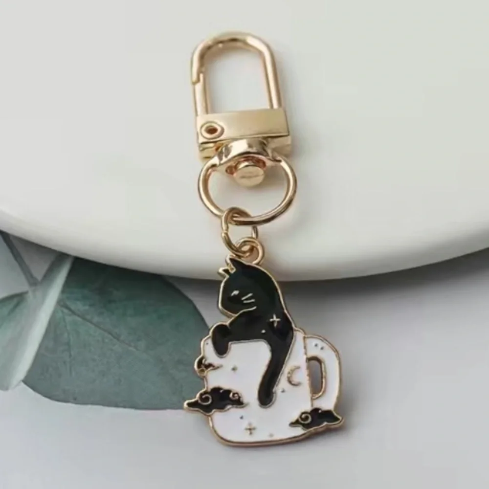 Cat in Coffee Cup With Clouds Keychain